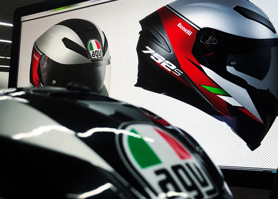 Close-up of AGV helmets with Benelli graphics